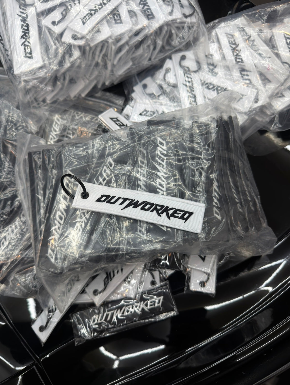 OUTWORKED Keychain