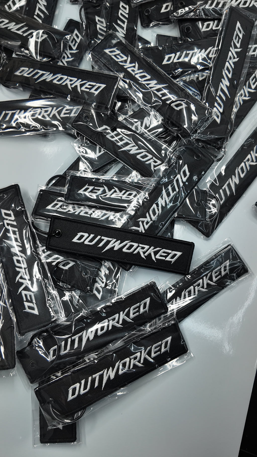 OUTWORKED Keychain