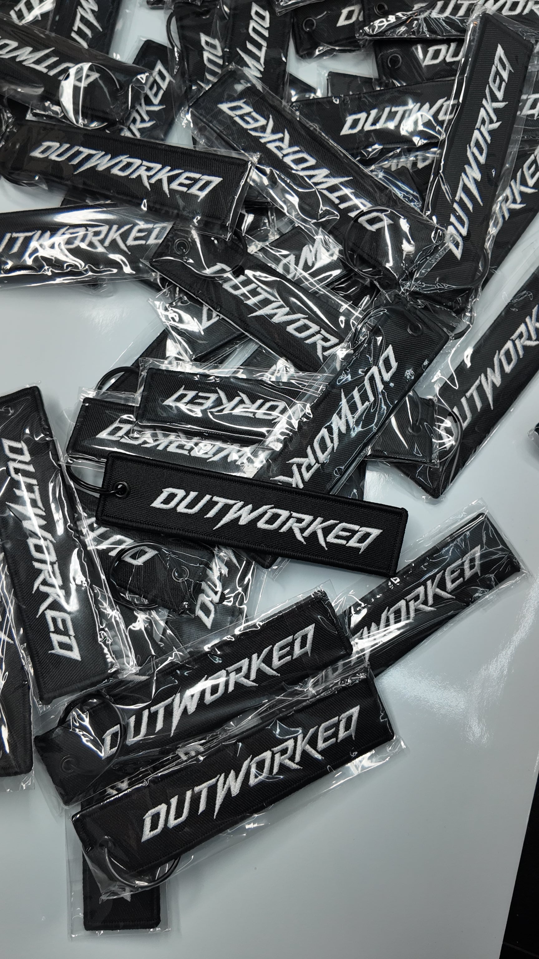 OUTWORKED Keychain
